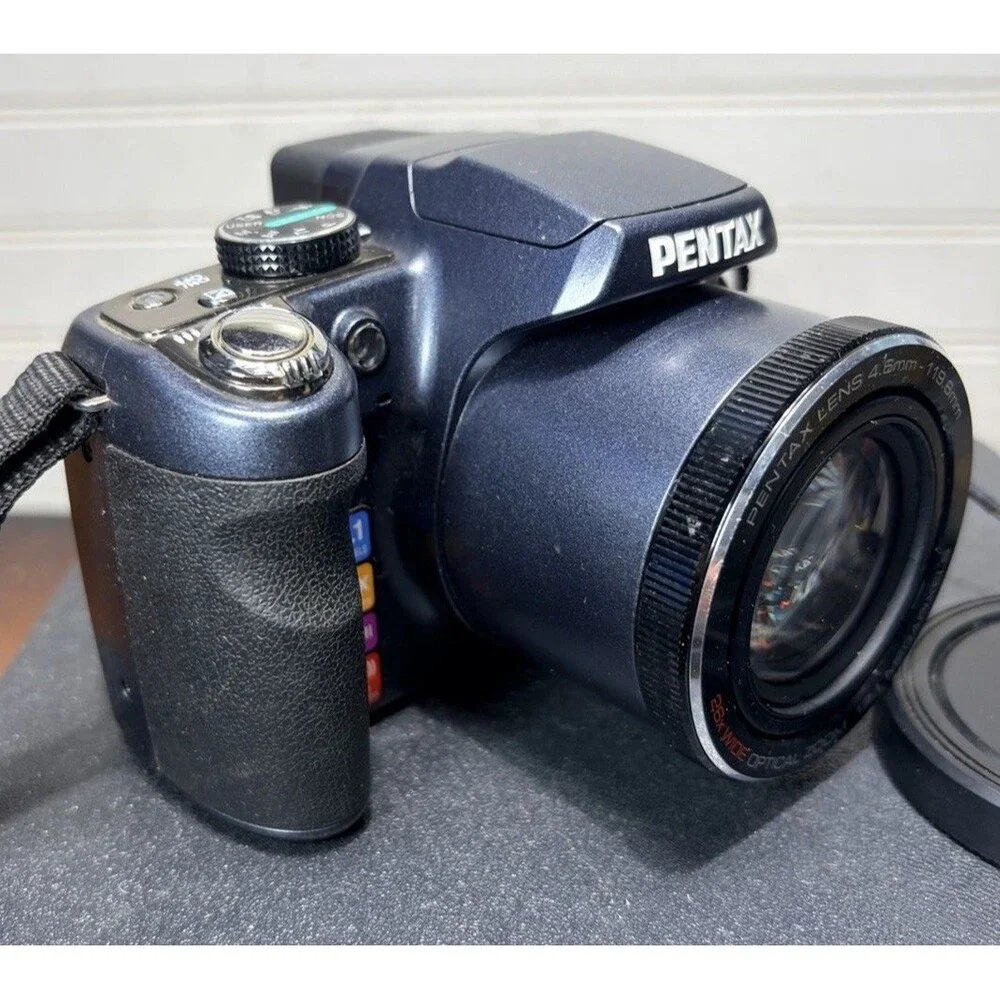 Pentax X90 12.1MP Digital Bridging Camera w/manual, Battery, Charger & Strap